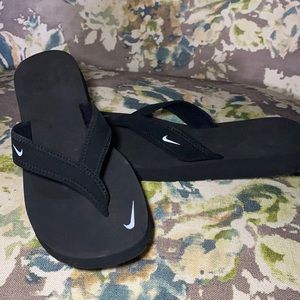 Brand new, never worn Nike flip flops